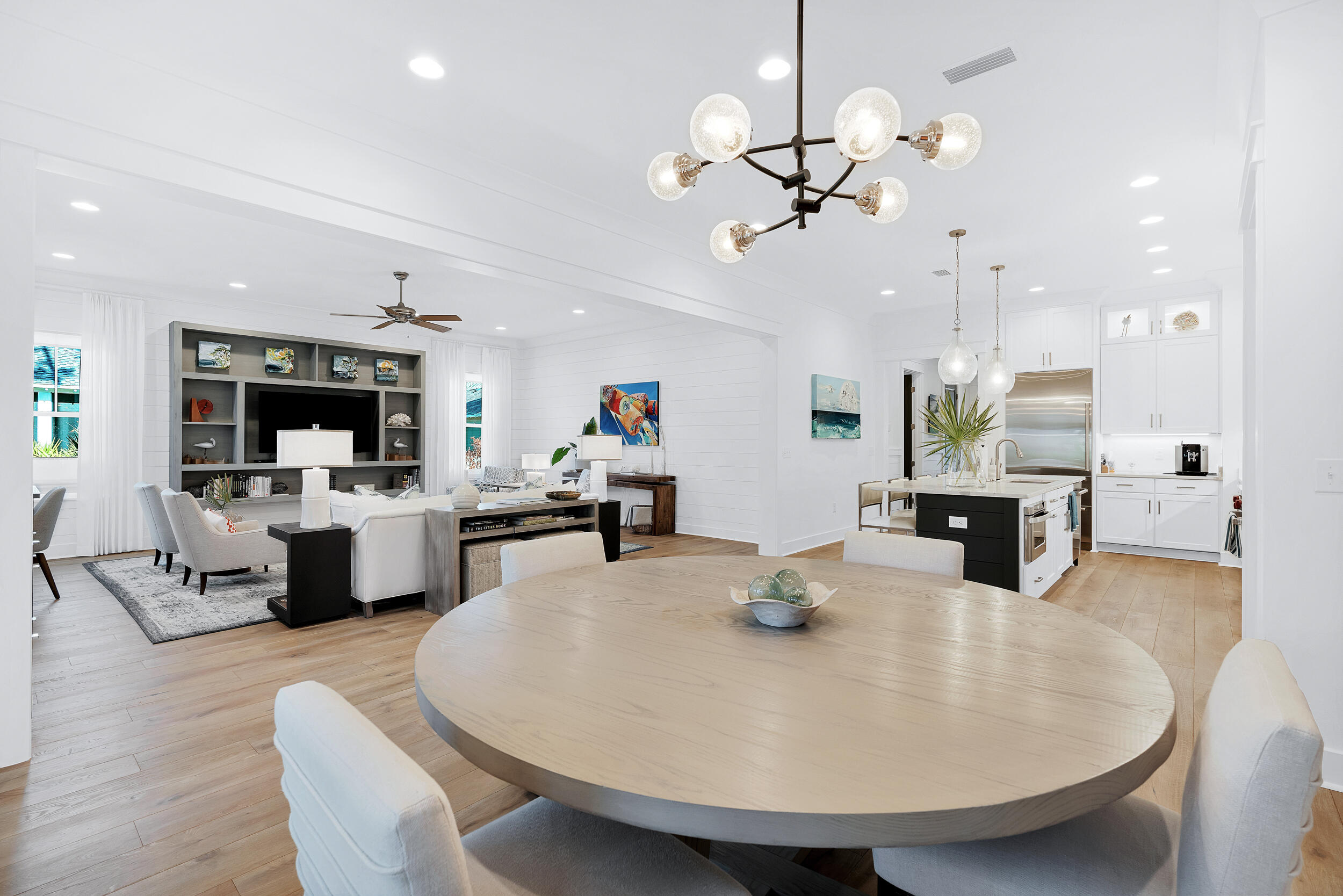 129 Firefly Way, Unit LOT 75 Watersound, FL 32461 - Photo 6 of 56 a dining room with furniture and wooden floor