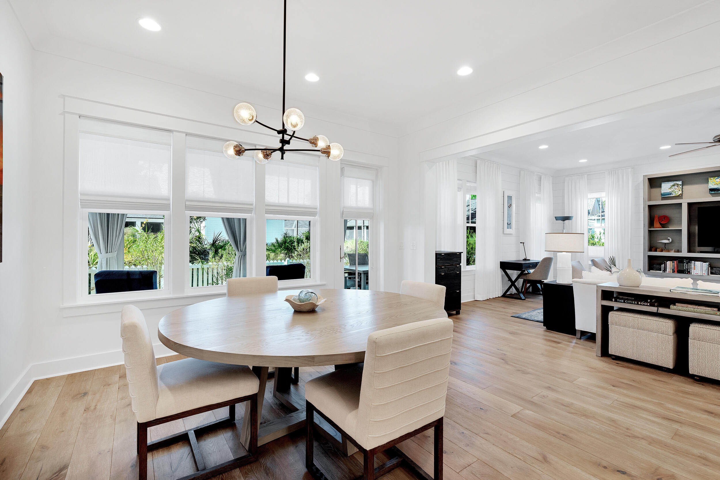 129 Firefly Way, Unit LOT 75 Watersound, FL 32461 - Photo 7 of 56 a view of a dining room with furniture window and wooden floor