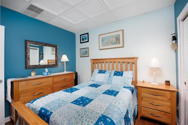 a bedroom with a bed and furniture