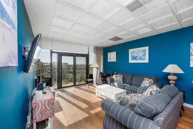 a bedroom with a bed and a lamp