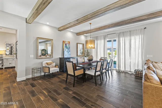 a bedroom with a bed and ceiling fan