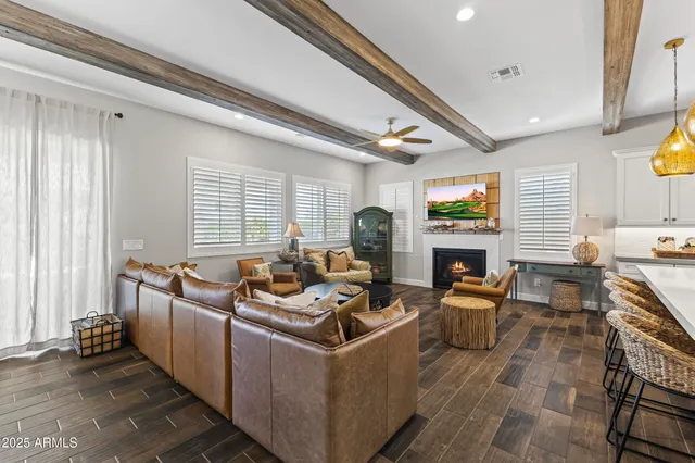 a bedroom with furniture and a dresser