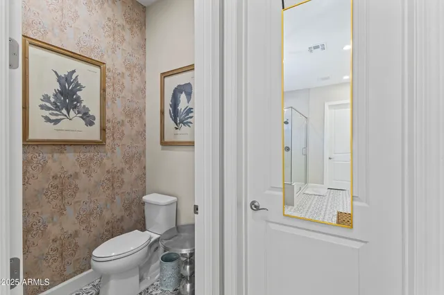 a view of room with furniture and wooden floor