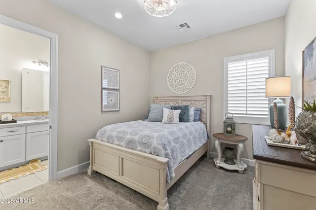 a building outdoor space with patio furniture and potted plants