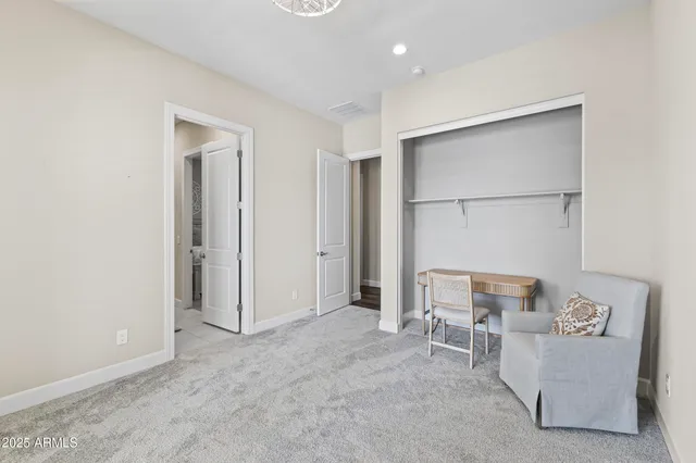 a bathroom with a toilet and shower