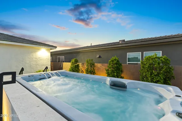 a kitchen with stainless steel appliances granite countertop a stove and cabinets