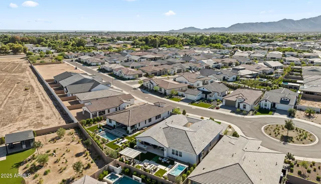 a view of a patio with table and chairs