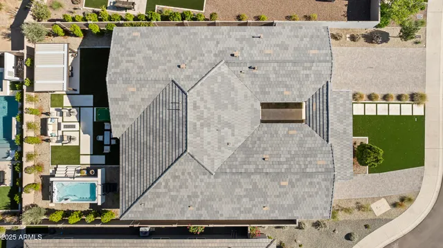 a view of a lake with boats and trees in the background