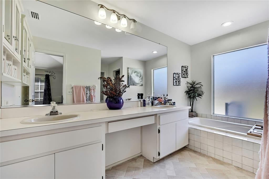 83 Greentree Street Homosassa, FL 34446 - Photo 11 of 49 a bathroom with a sink and a mirror