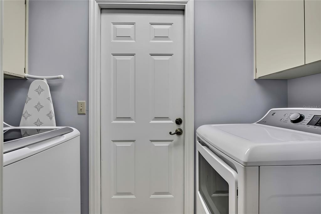 83 Greentree Street Homosassa, FL 34446 - Photo 26 of 49 a utility room with dryer and washer