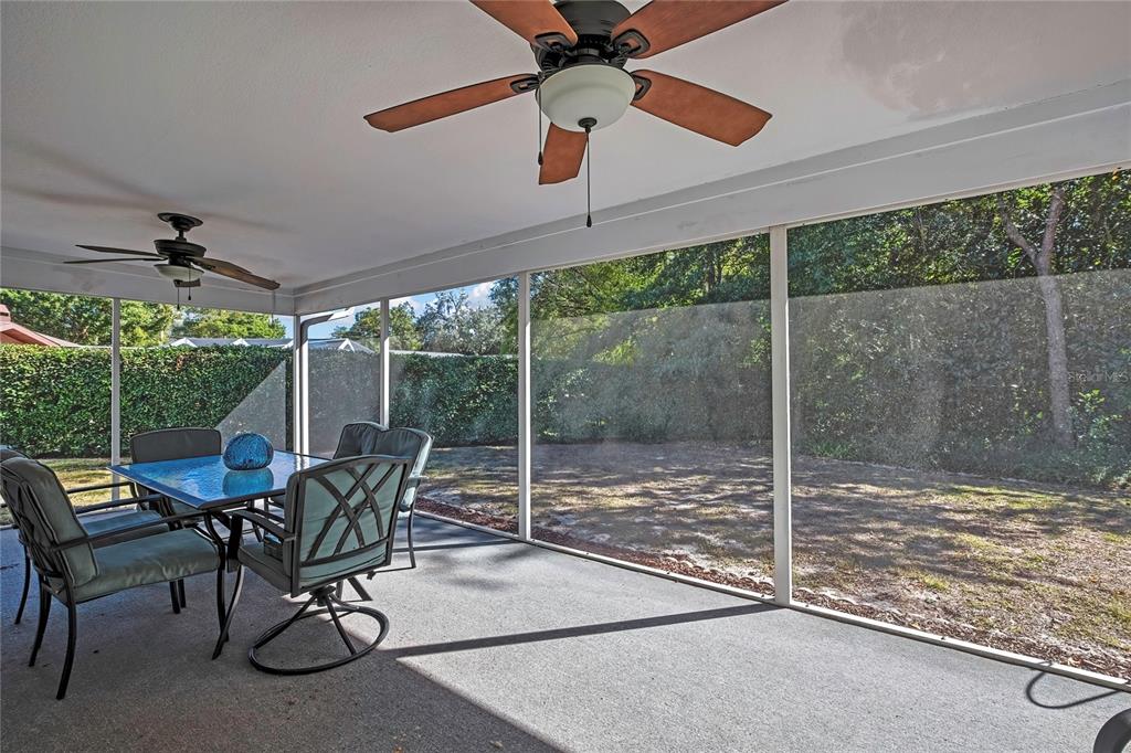 83 Greentree Street Homosassa, FL 34446 - Photo 34 of 49 a view of a room with a table and chairs