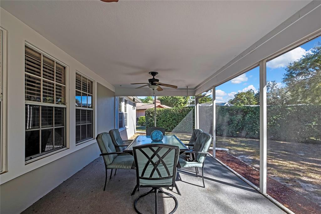 83 Greentree Street Homosassa, FL 34446 - Photo 35 of 49 a view of a porch with chairs and backyard