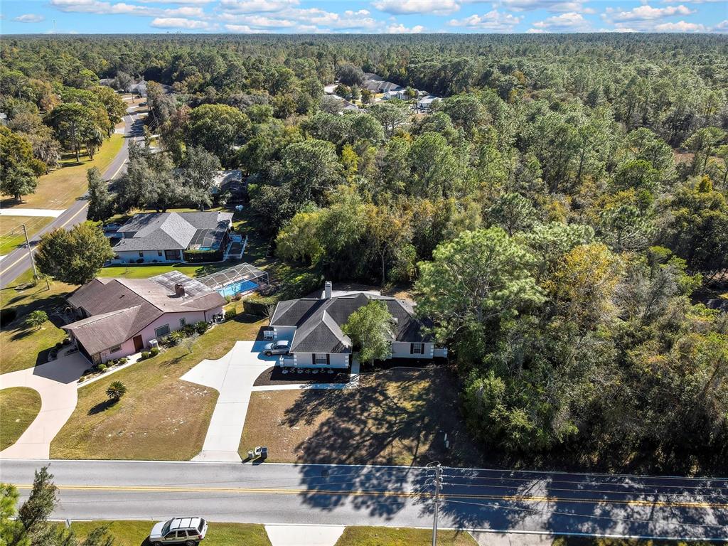 83 Greentree Street Homosassa, FL 34446 - Photo 42 of 49 an aerial view of residential houses with outdoor space