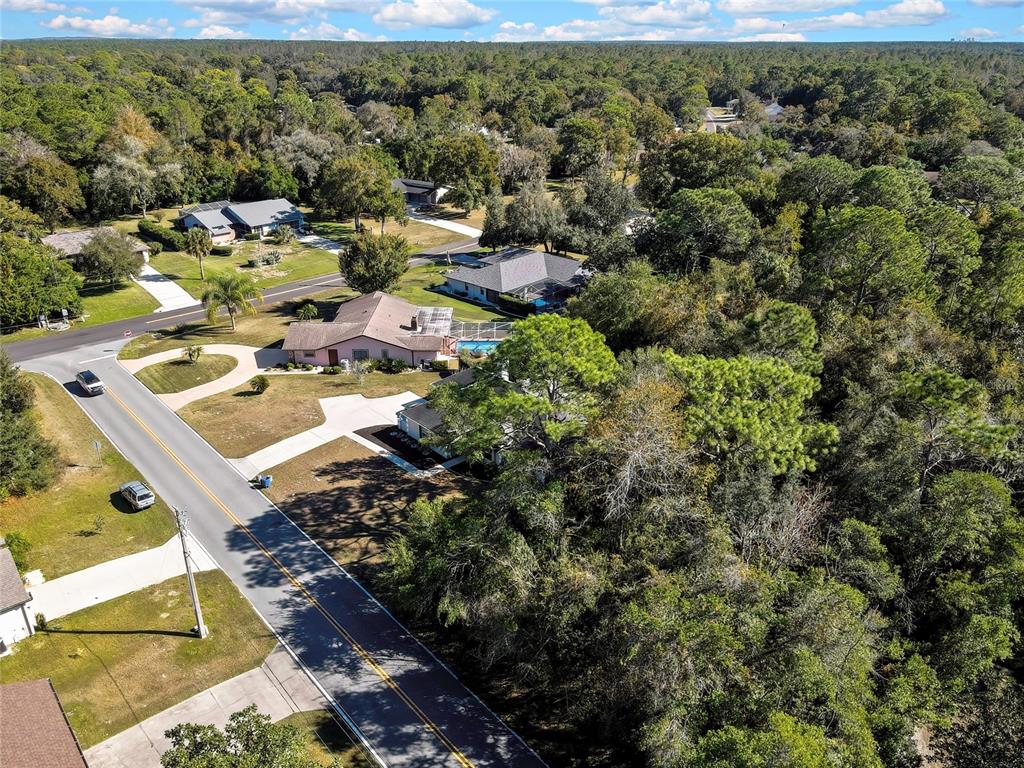 83 Greentree Street Homosassa, FL 34446 - Photo 43 of 49 an aerial view of residential houses with outdoor space