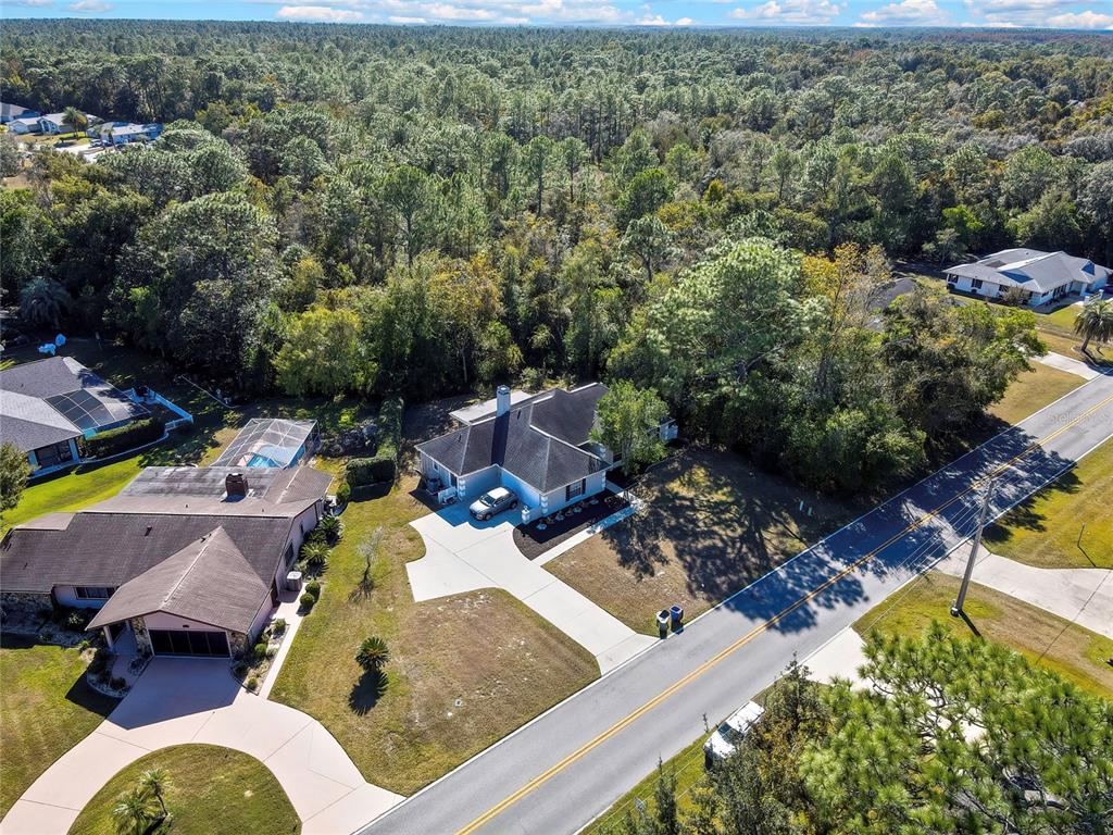 83 Greentree Street Homosassa, FL 34446 - Photo 48 of 49 an aerial view of a house with yard swimming pool and outdoor seating