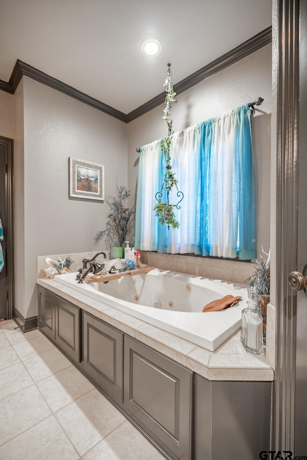 13307 Dustin Road Troup, TX 75789 - Photo 26 of 38 a bathroom with a sink and a mirror