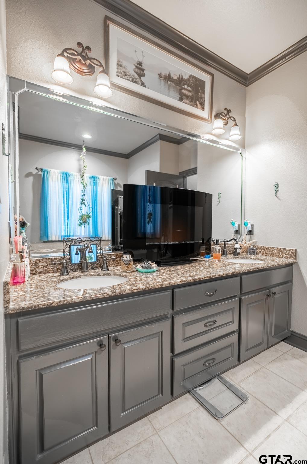 13307 Dustin Road Troup, TX 75789 - Photo 27 of 38 a bathroom with a sink and a mirror