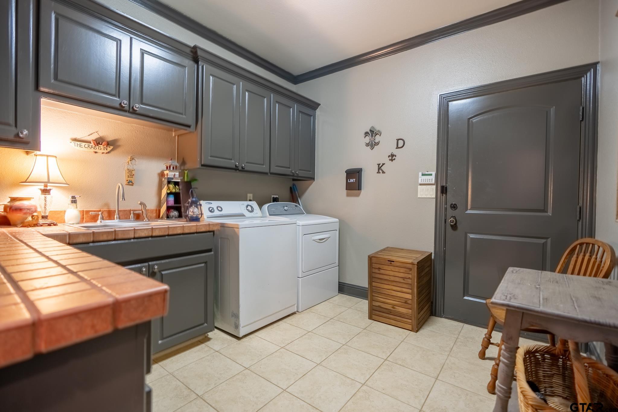 13307 Dustin Road Troup, TX 75789 - Photo 28 of 38 a room with storage and utility