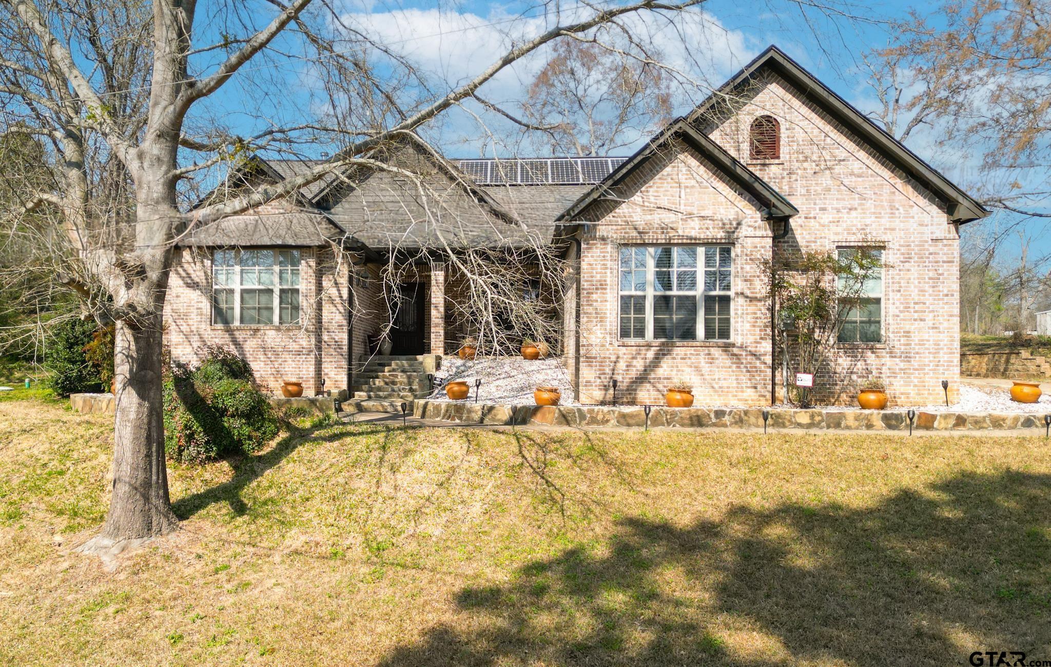 13307 Dustin Road Troup, TX 75789 - Photo 3 of 38 a view of a house with snow on the wall