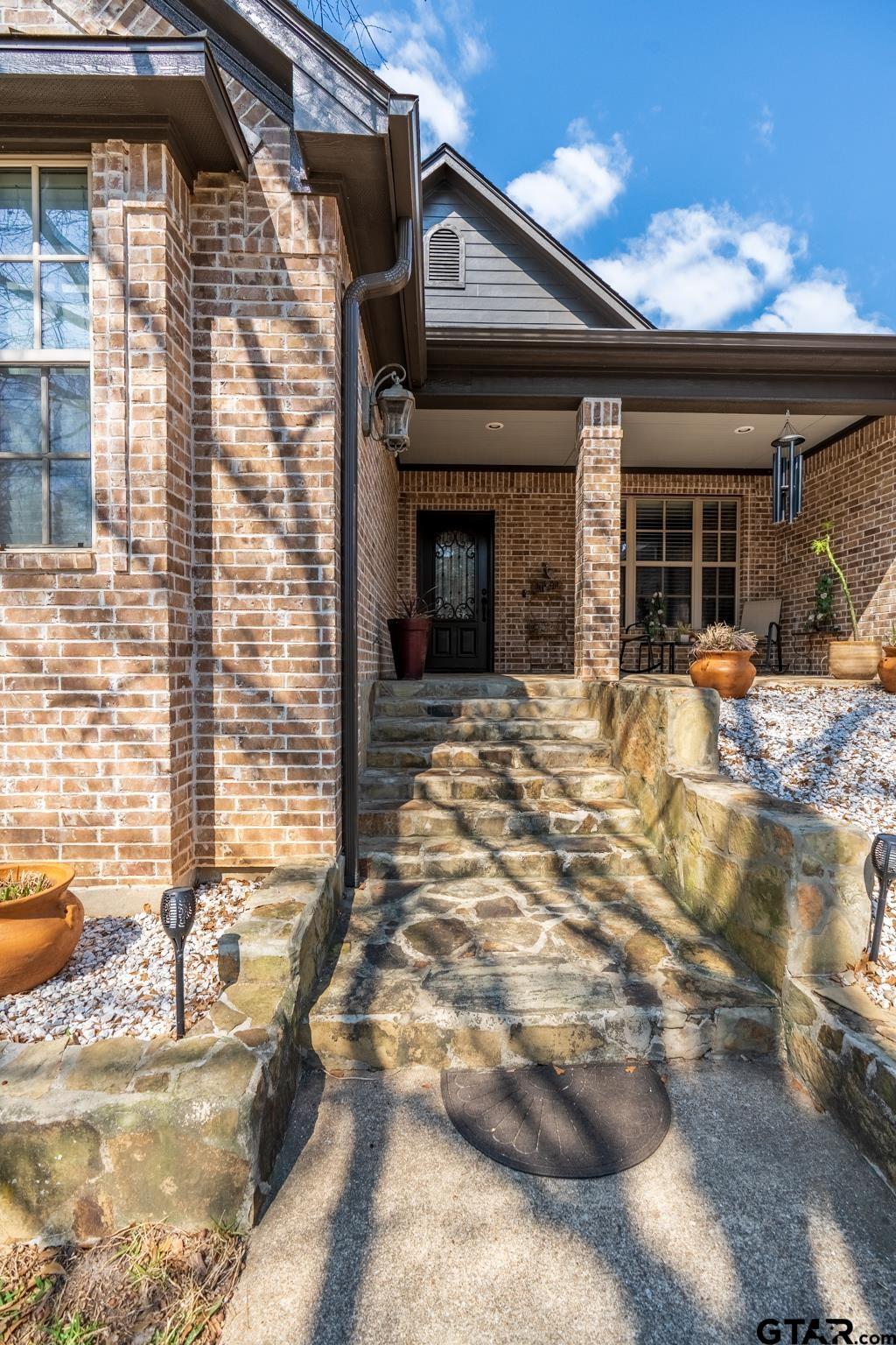 13307 Dustin Road Troup, TX 75789 - Photo 6 of 38 a view of a house with a patio
