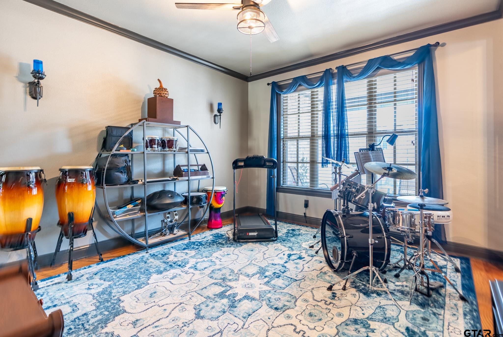 13307 Dustin Road Troup, TX 75789 - Photo 10 of 38 a bedroom with furniture and a window