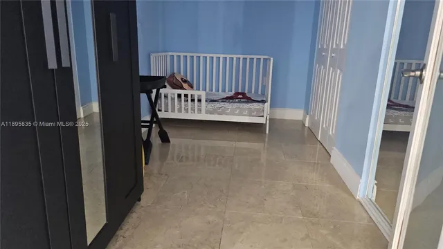 a two chairs sitting in front of a building