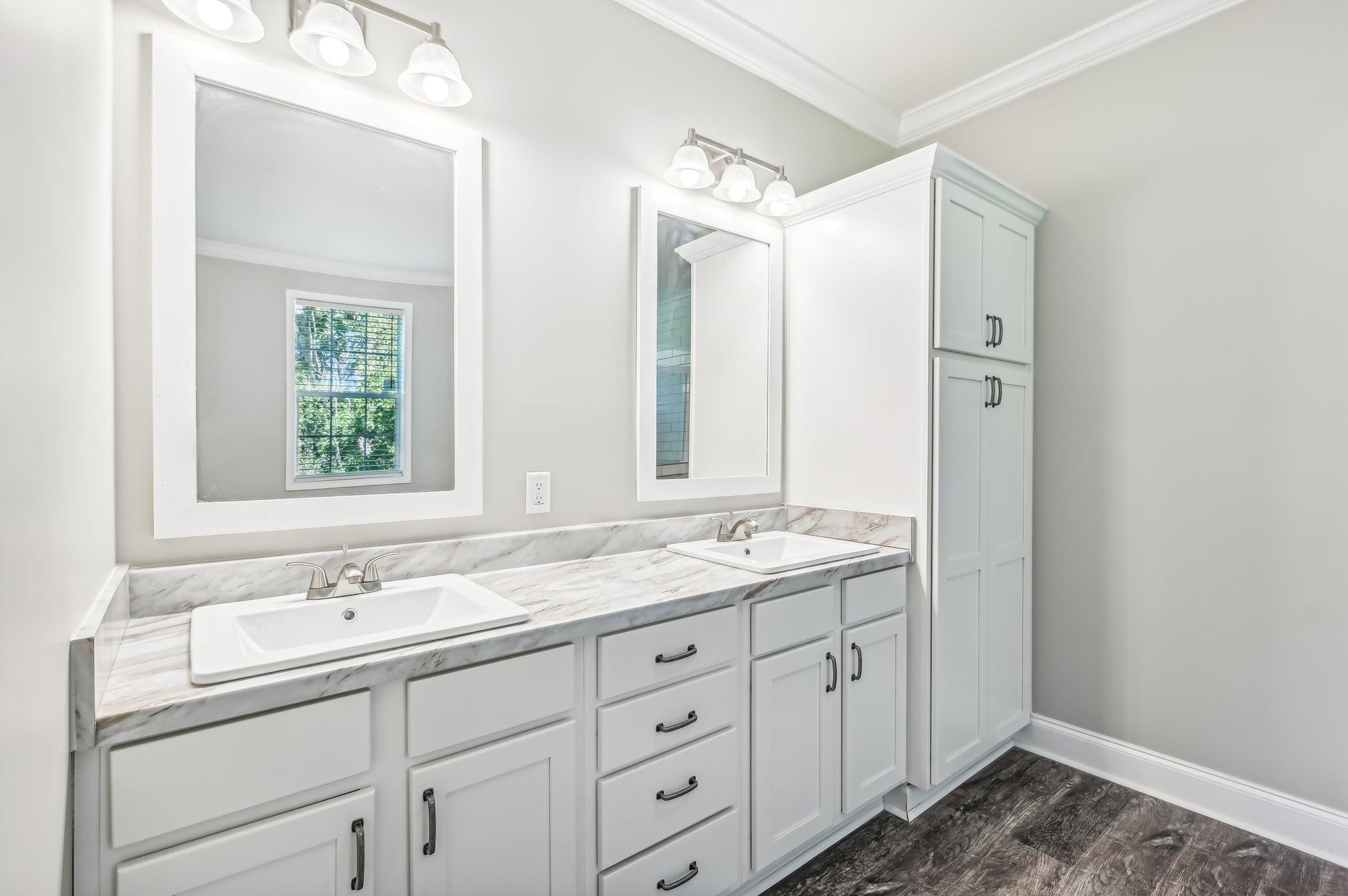 4954 A1A South St. Augustine, FL 32080 - Photo 20 of 42 a spacious bathroom with a granite countertop sink mirror and double