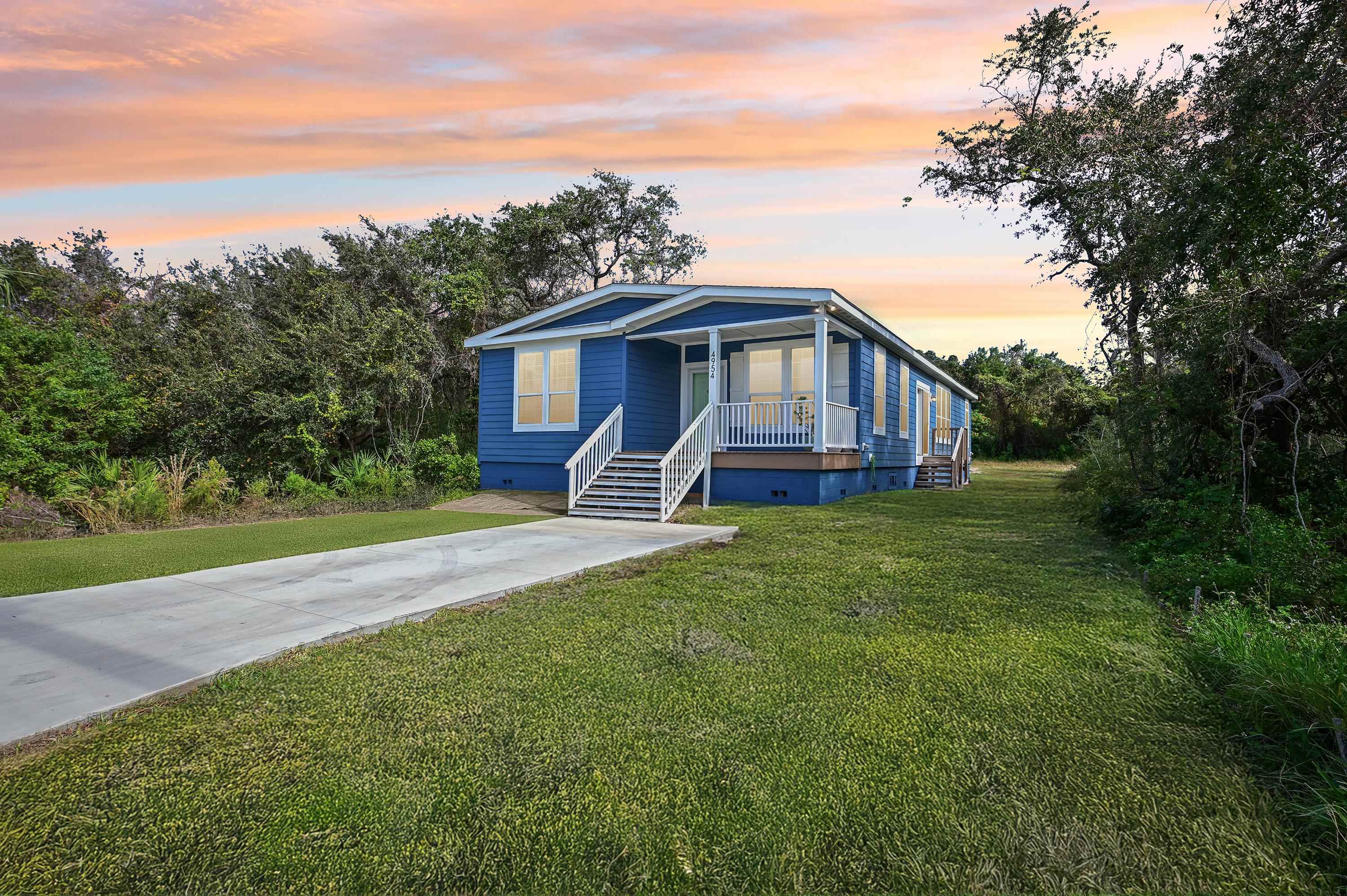 4954 A1A South St. Augustine, FL 32080 - Photo 2 of 42 a view of a house with a yard