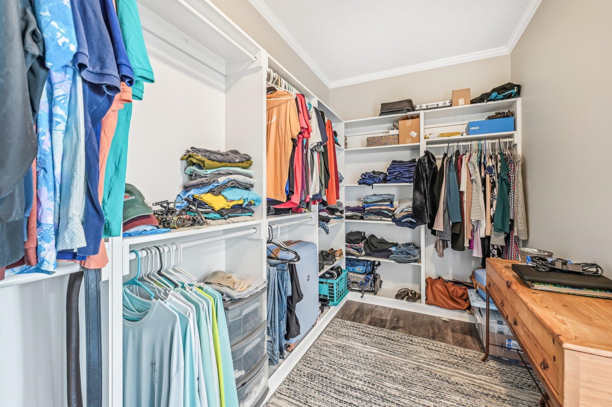 4954 A1A South St. Augustine, FL 32080 - Photo 23 of 42 a view of walk in closet with clothes