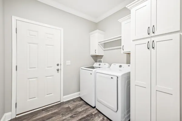 a utility room with dryer and washer