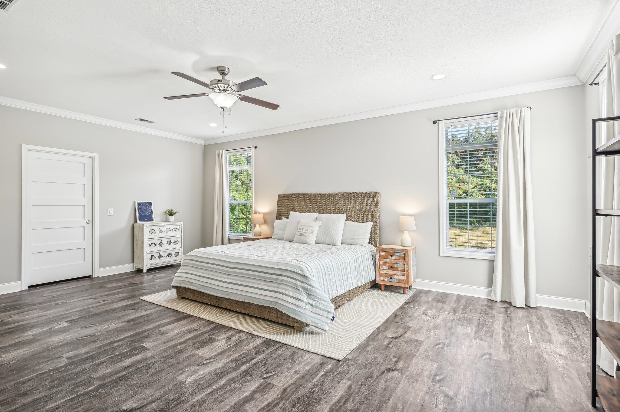 4954 A1A South St. Augustine, FL 32080 - Photo 5 of 42 a spacious bedroom with a bed and a window