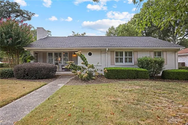 front view of a house with yard