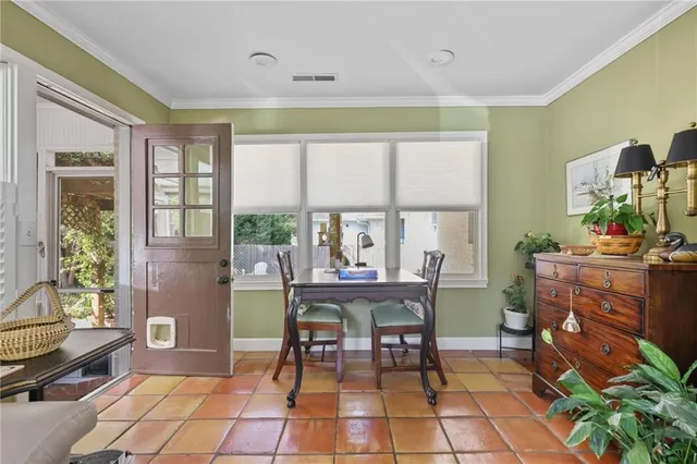 a dining room with a table and chair