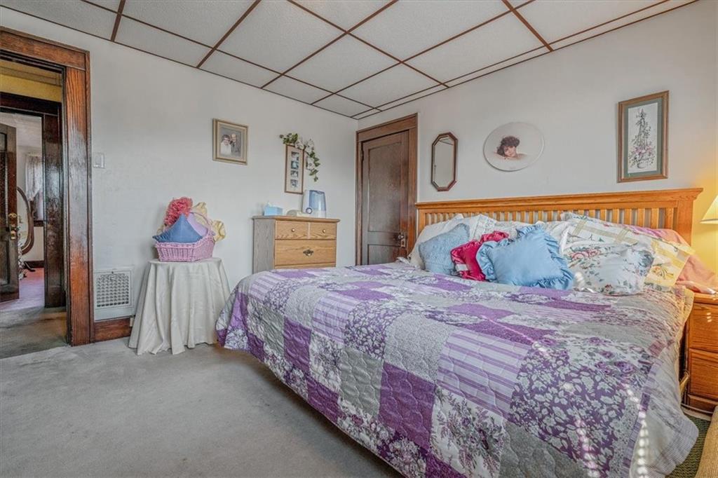 306 Meadow Avenue Charleroi, PA 15022 - Photo 18 of 36 a bedroom with a bed and dresser