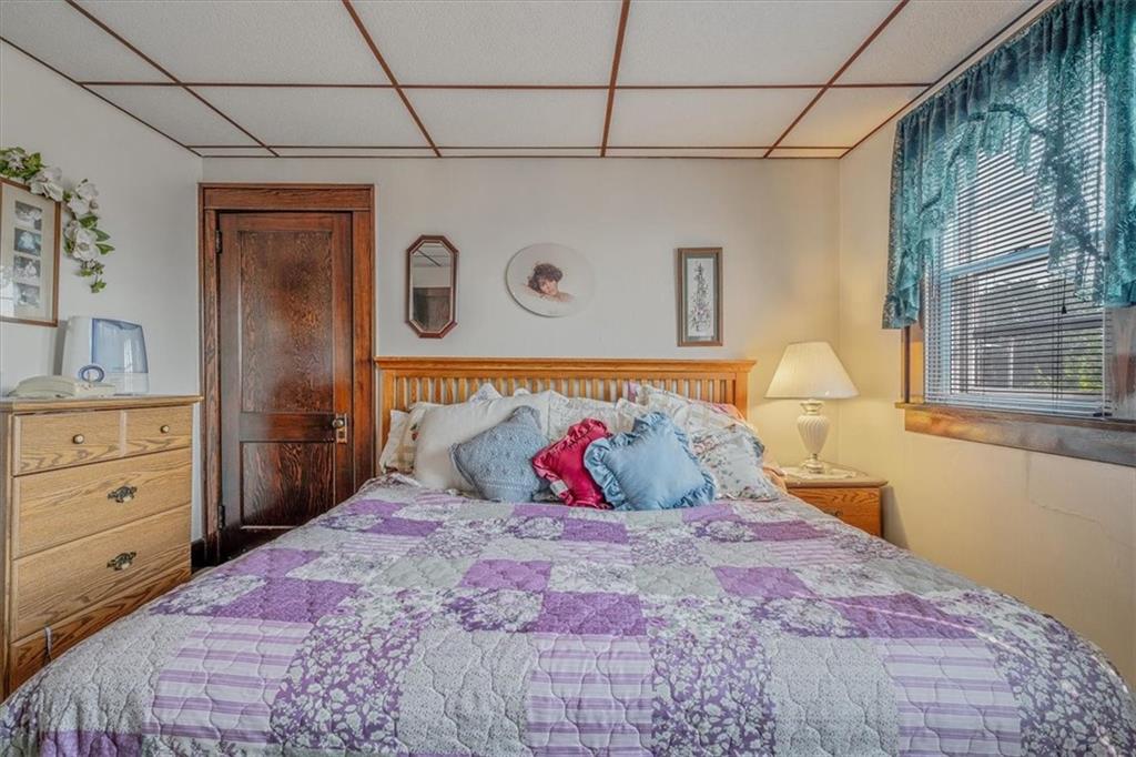 306 Meadow Avenue Charleroi, PA 15022 - Photo 19 of 36 a bedroom with a bed and a window