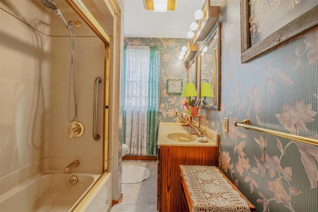 306 Meadow Avenue Charleroi, PA 15022 - Photo 20 of 36 a bathroom with a tub a sink and a shower