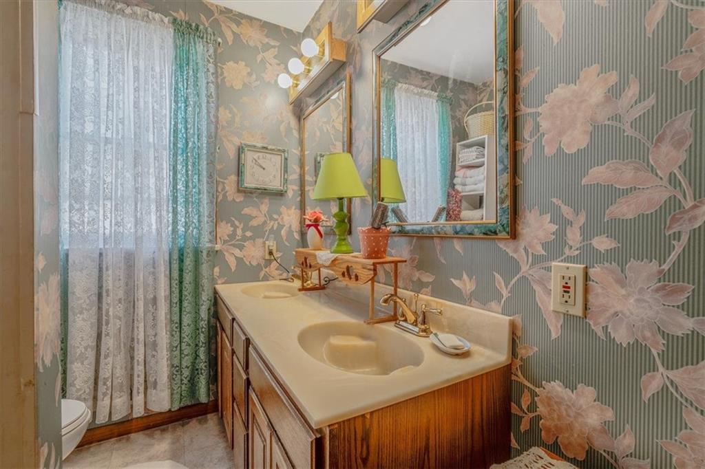 306 Meadow Avenue Charleroi, PA 15022 - Photo 21 of 36 a bathroom with a sink and a mirror