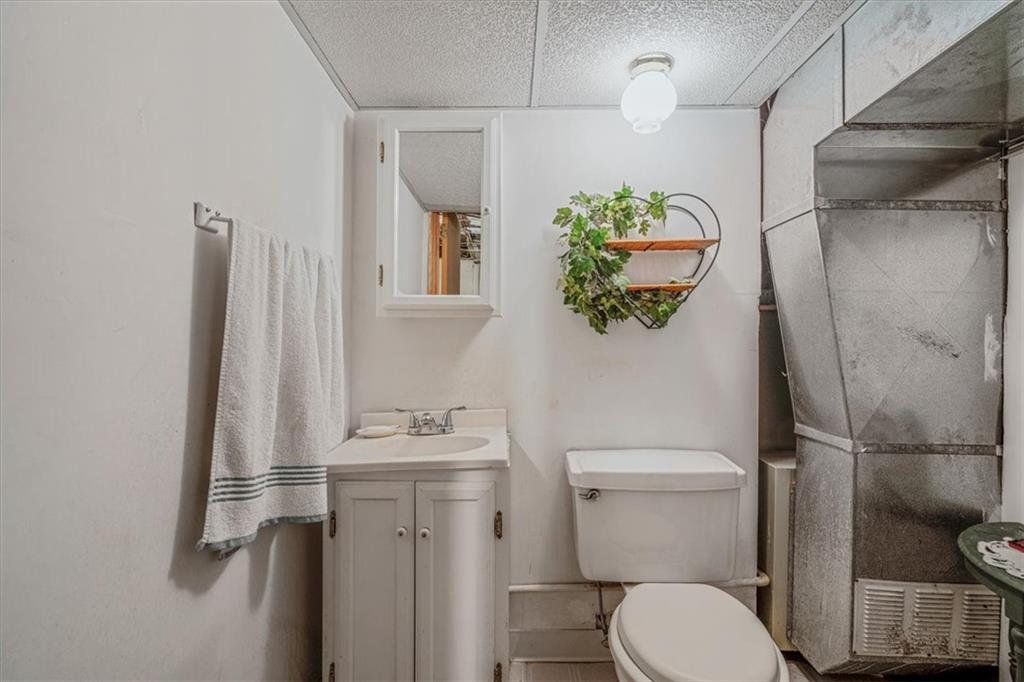 306 Meadow Avenue Charleroi, PA 15022 - Photo 25 of 36 a bathroom with a sink toilet and shower