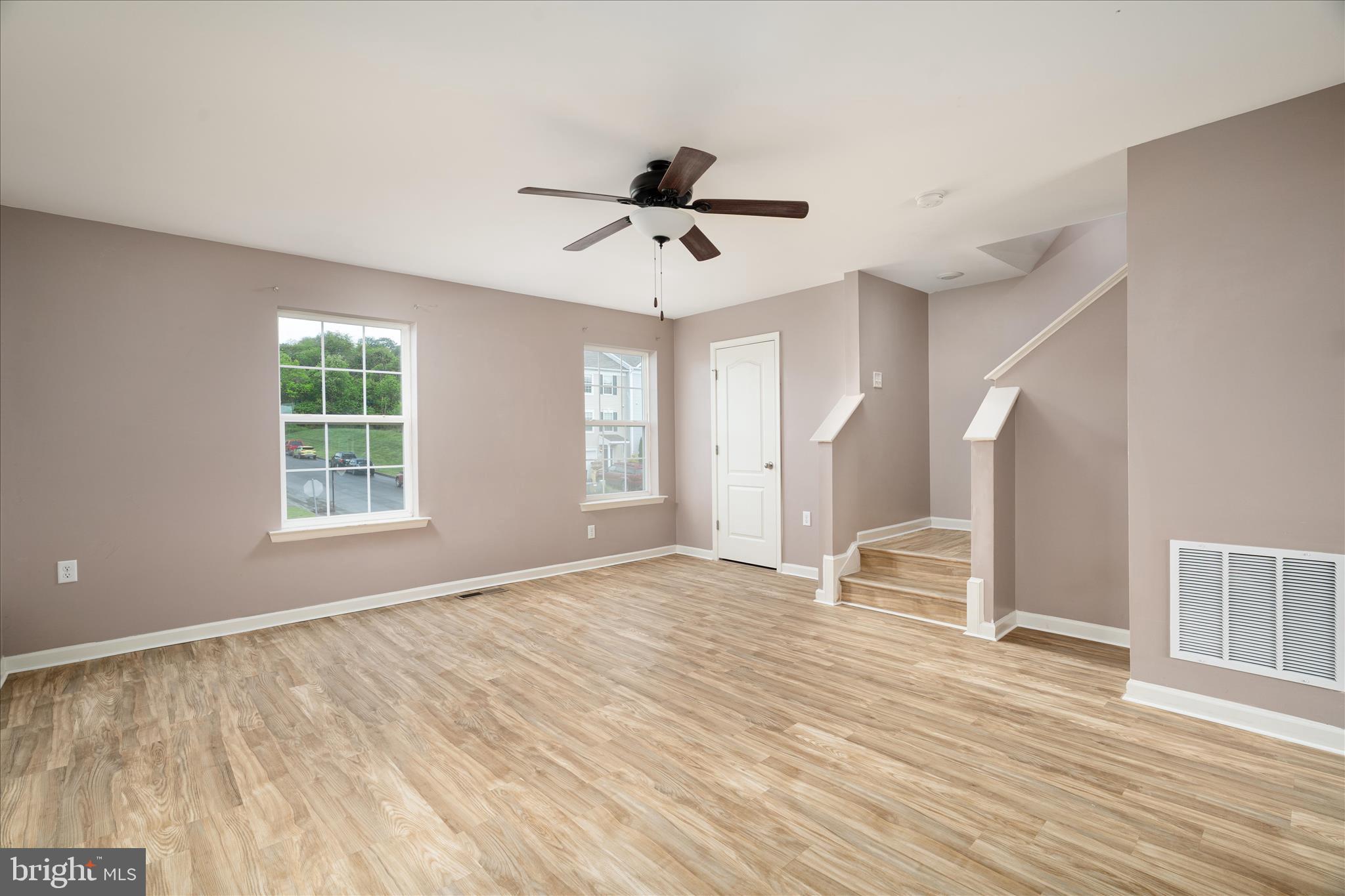 408 Rumbling Rock Road Hedgesville, WV 25427 - Photo 8 of 23 Spacious Family room with half bath