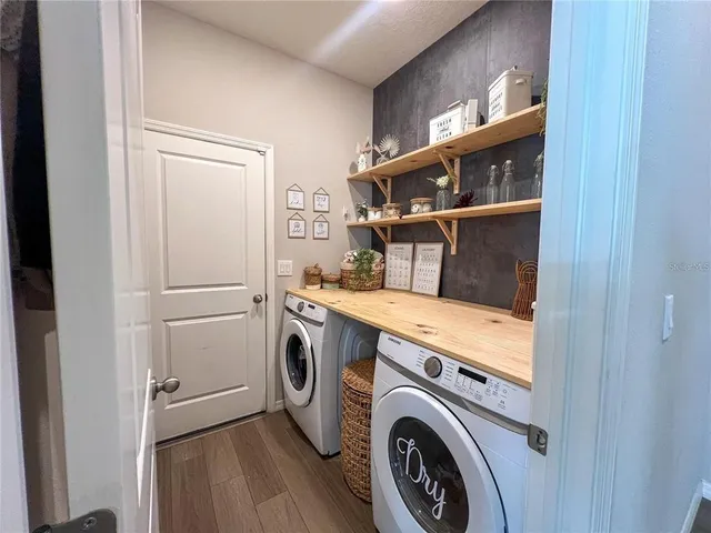 a utility room with dryer and washer