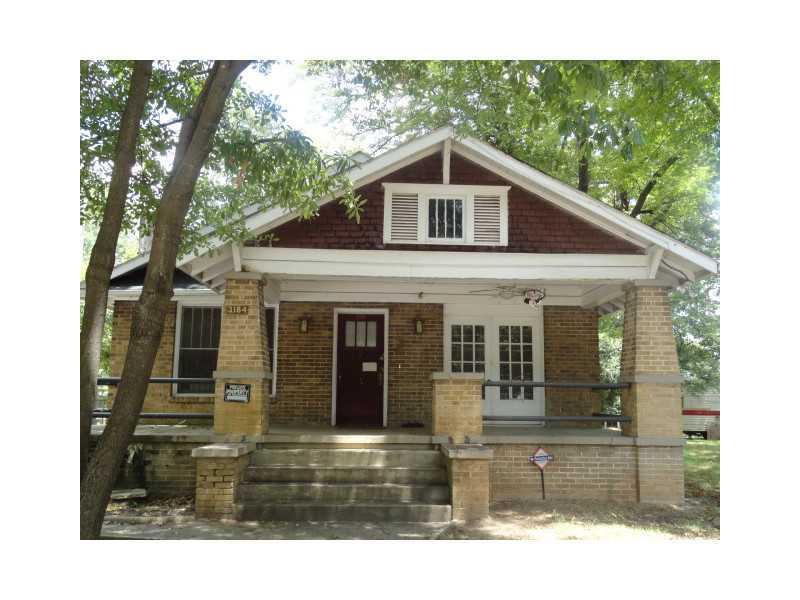 3184 East Point Street Atlanta, GA 30344 - Photo 1 of 1 Exterior Front. rocking chair front porch.House faces west