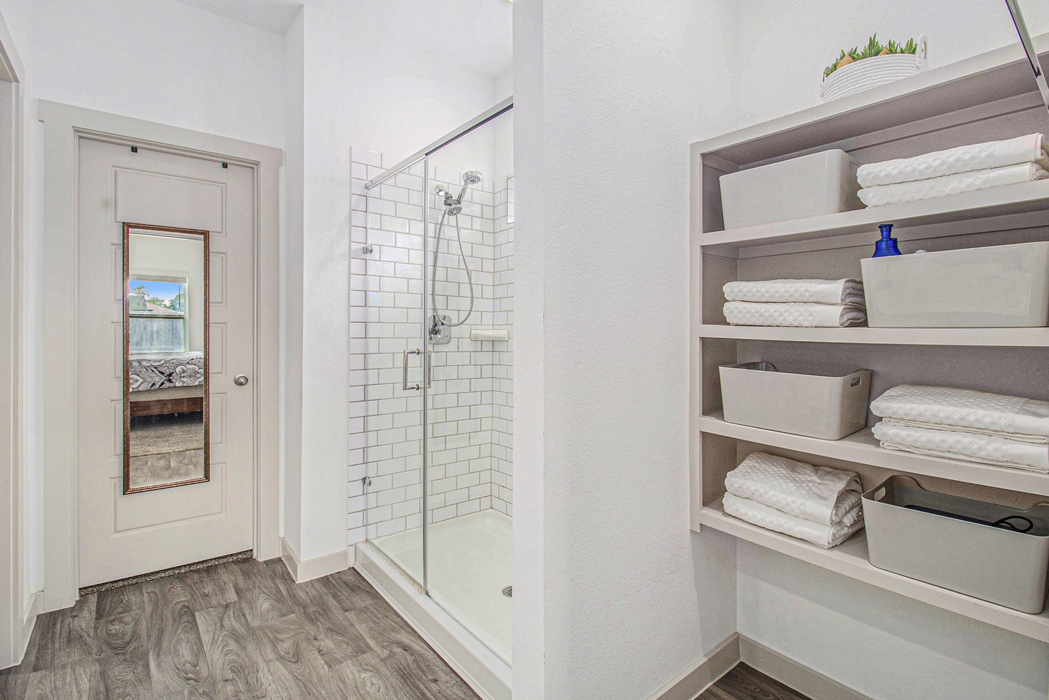 1823 William Scott Street Baytown, TX 77523 - Photo 17 of 27 a view of walk in closet with empty racks