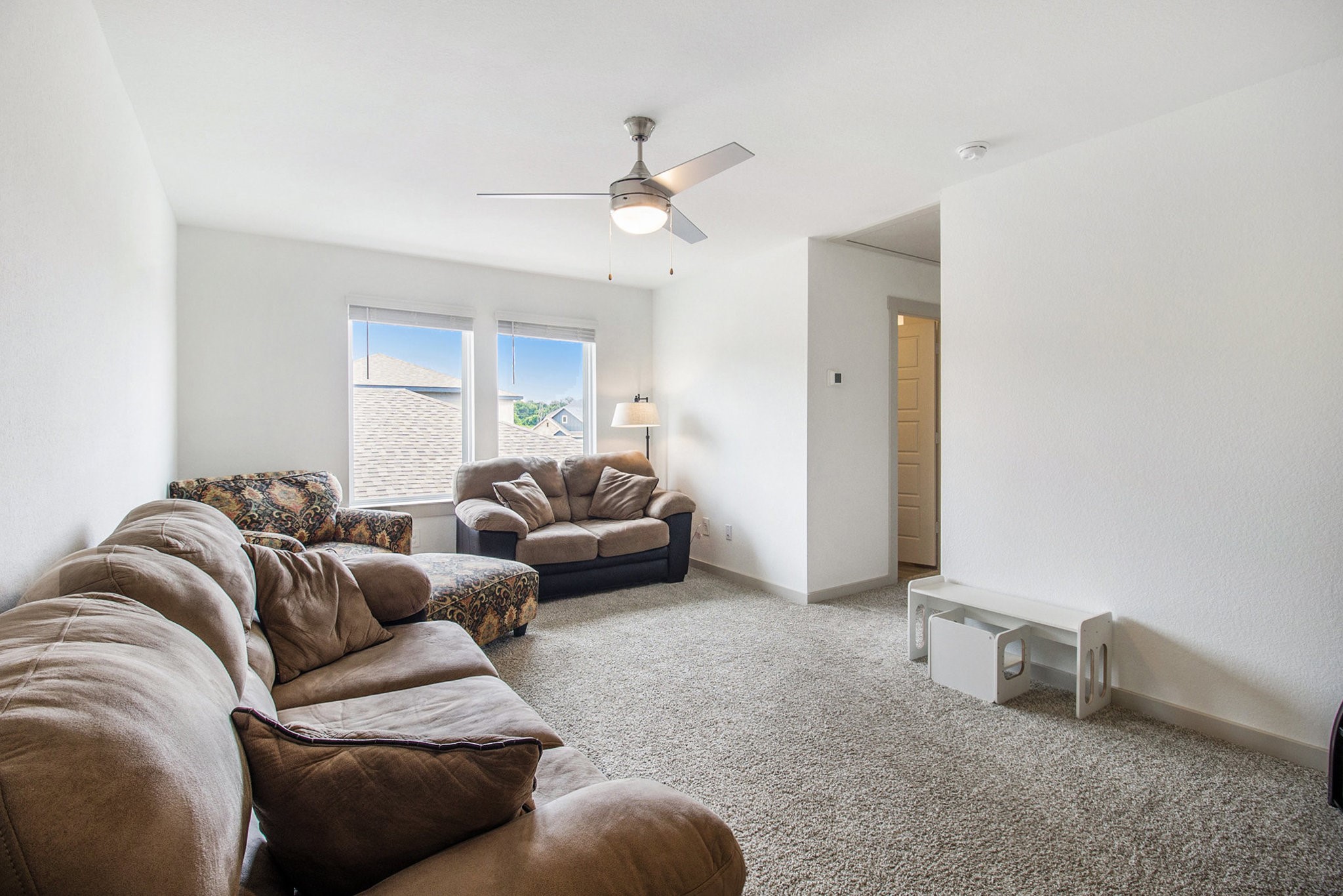 1823 William Scott Street Baytown, TX 77523 - Photo 21 of 27 a living room with furniture and a ceiling fan