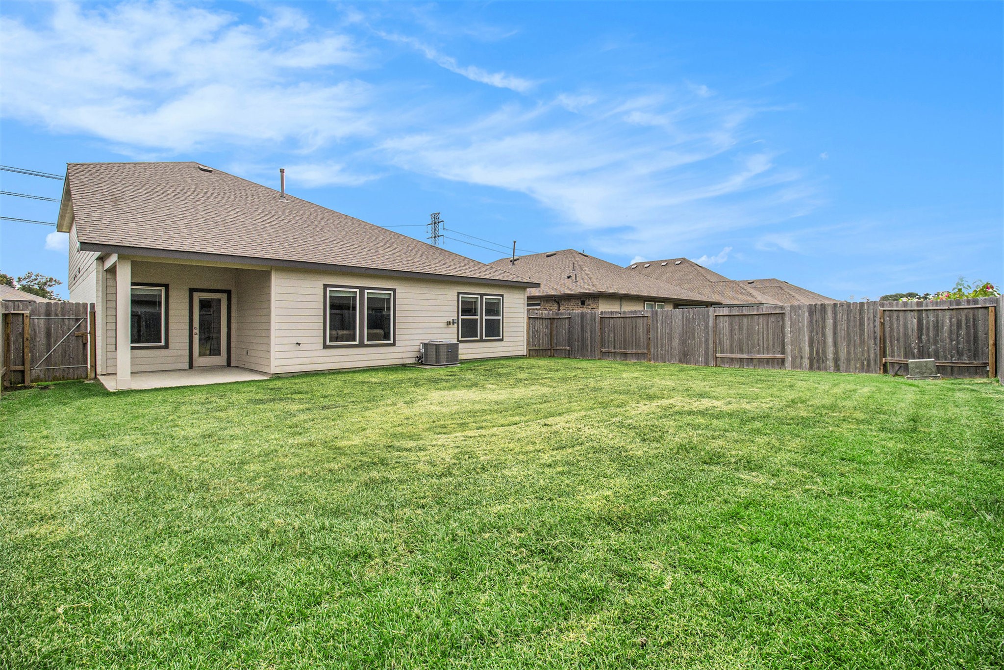 1823 William Scott Street Baytown, TX 77523 - Photo 26 of 27 a front view of a house with a garden