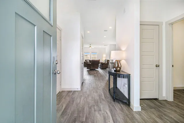 a view of a kitchen from the hallway