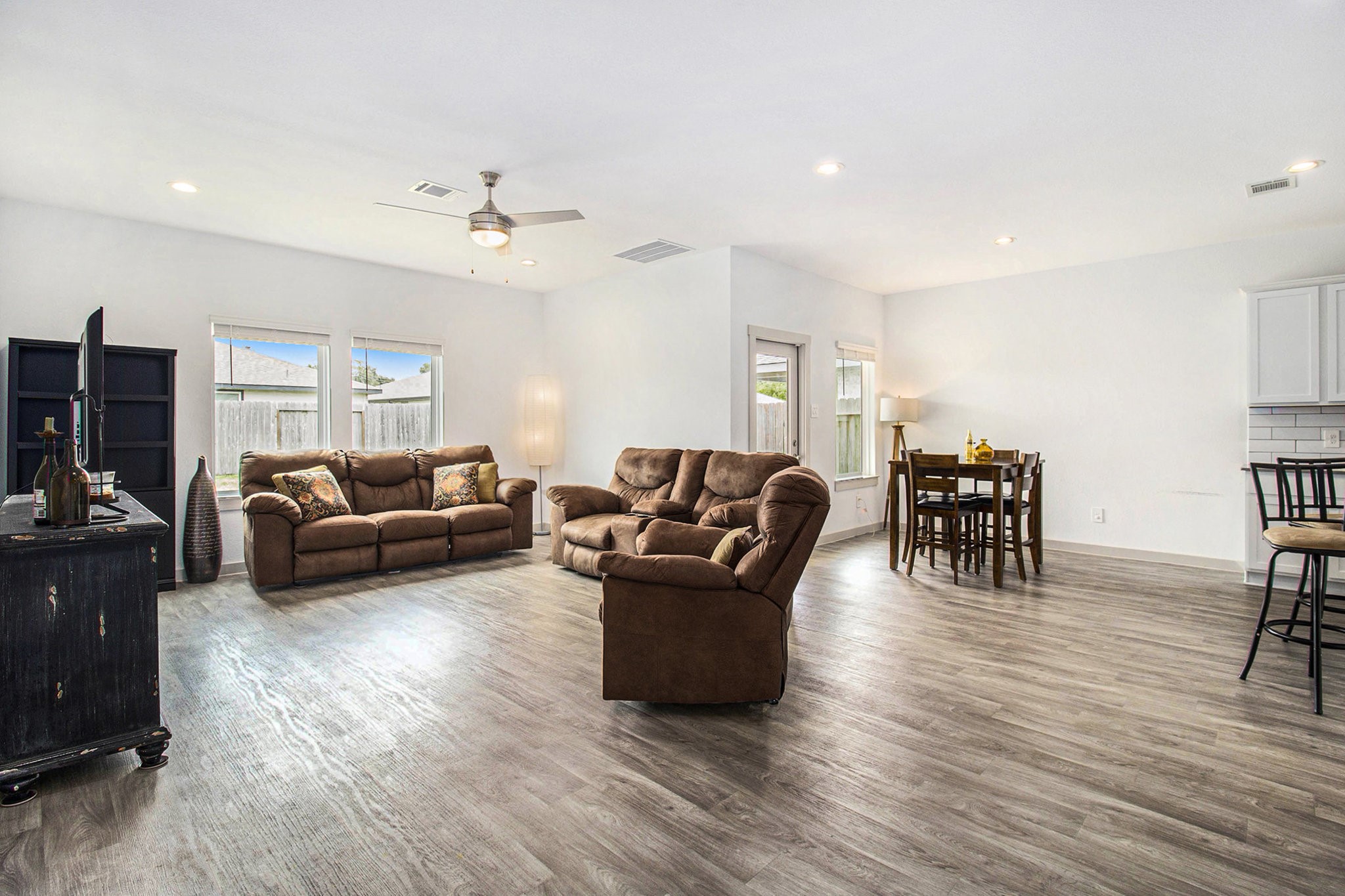 1823 William Scott Street Baytown, TX 77523 - Photo 7 of 27 a living room with furniture and a wooden floor