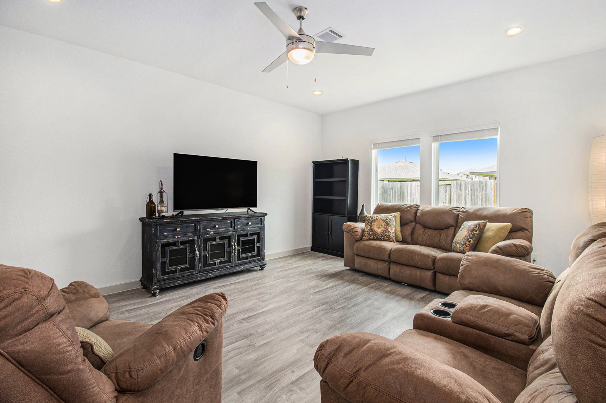 1823 William Scott Street Baytown, TX 77523 - Photo 9 of 27 a living room with furniture and a flat screen tv