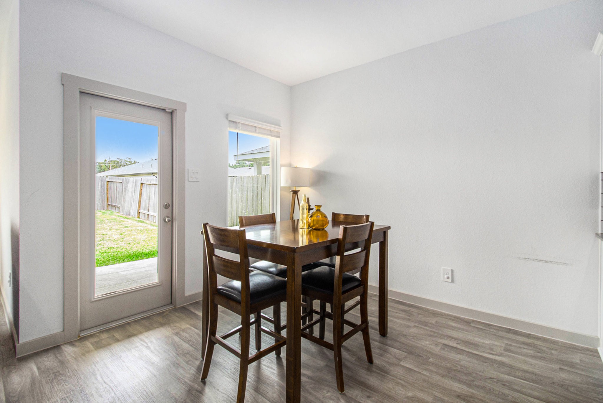 1823 William Scott Street Baytown, TX 77523 - Photo 10 of 27 a view of a dining room with furniture and wooden floor
