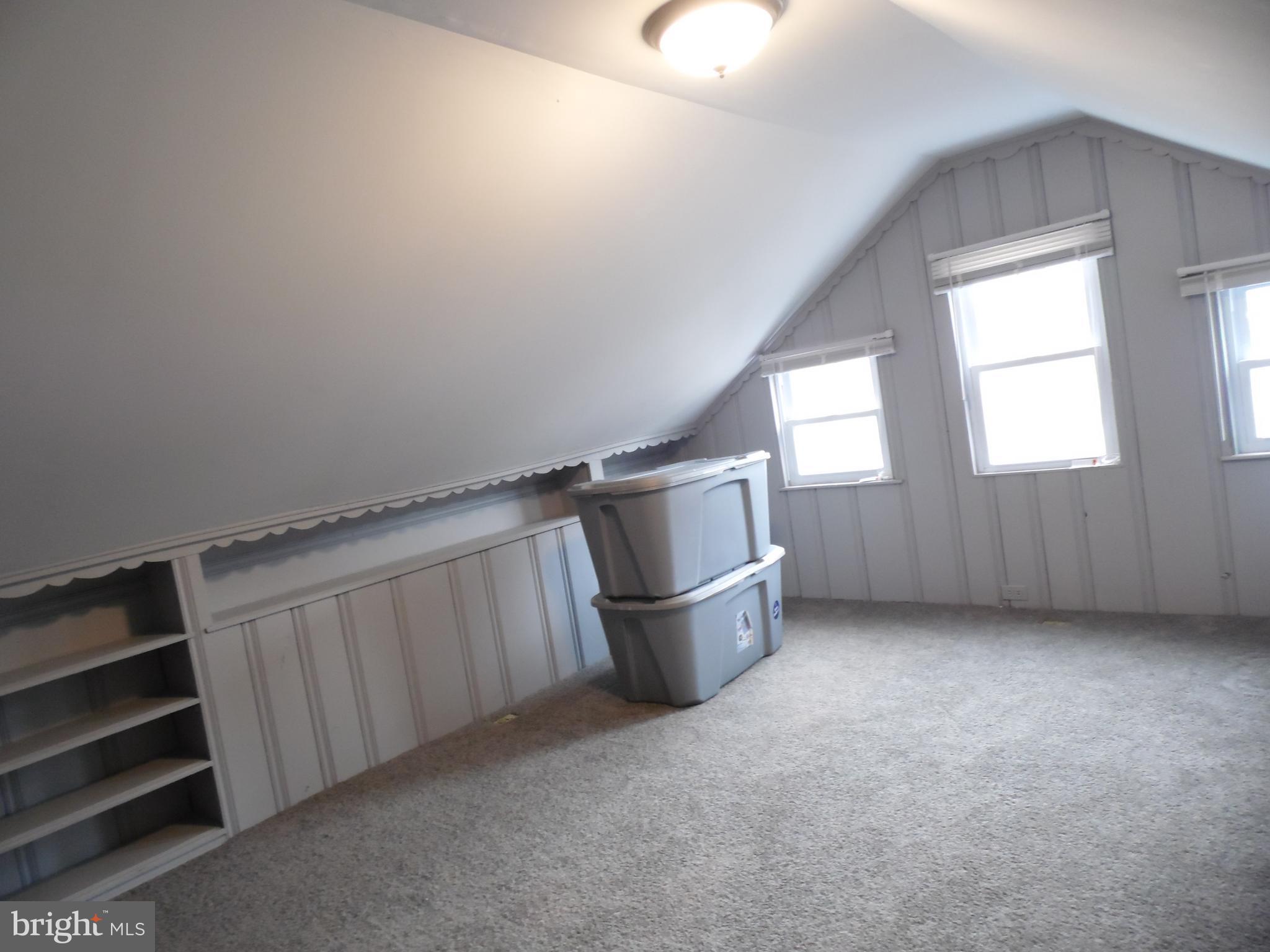 3727 Nortonia Road Baltimore, MD 21216 - Photo 14 of 21 Upstairs rear bedroom with built in shelves