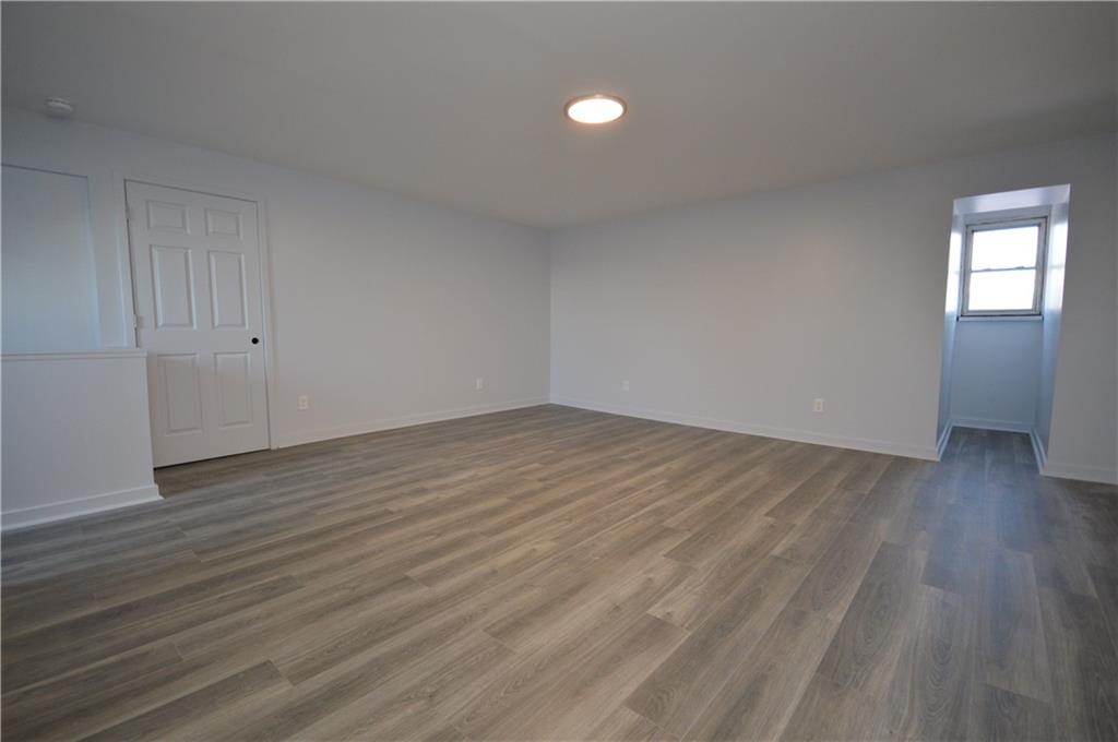 115 Meade Avenue Pittsburgh, PA 15202 - Photo 34 of 38 a view of empty room with wooden floor